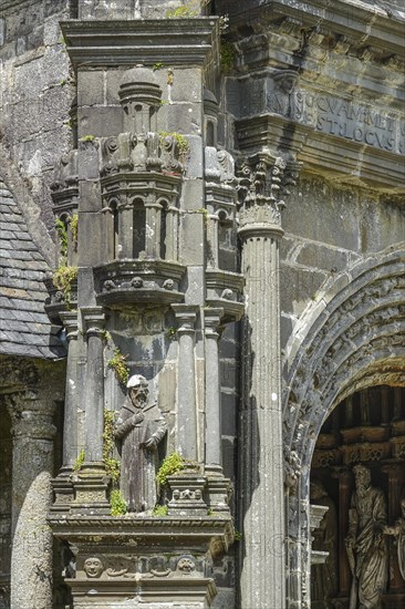 Side portal of the church, Enclos Paroissial parish of Guimiliau, Finistere Penn ar Bed department, Brittany Breizh region, France, Europe