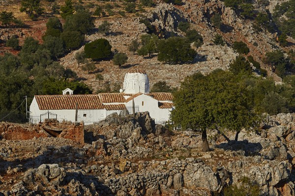 Church of St Michael the Archangel, Cross-domed church, Traditional building surrounded by rugged landscape and green trees, Aradena Gorge, Aradena, Sfakia, Crete, Greece, Europe