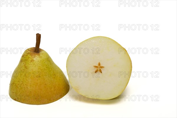Close-up of a fresh pear cut in half isolated on white background and copy space