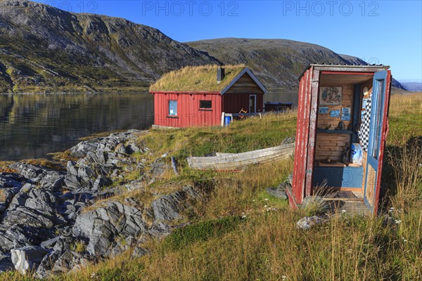 Rorbuer with toilet (outhouse) on the fjord off Bergen, summer, Nordkinn Peninsula, Finnmark, Norway, Europe