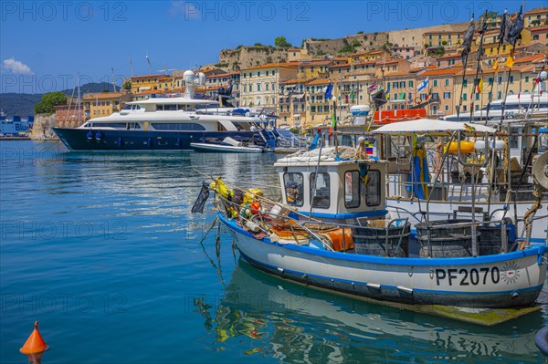 Fishing boats and luxury yachts in the harbour of Portoferraio, Elba, Tuscan Archipelago, Tuscany, Italy, Europe