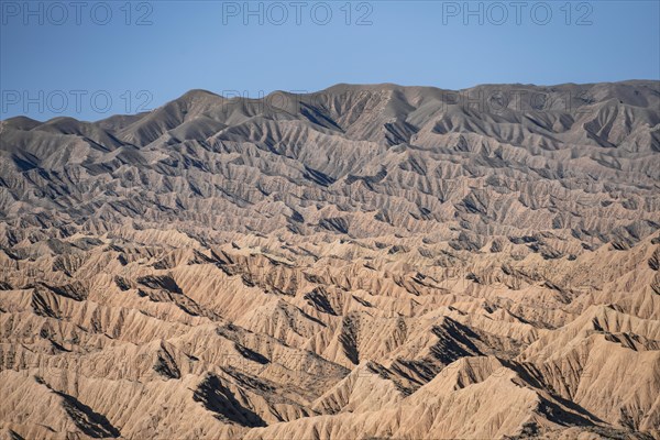 Canyons and eroded hills, Badlands, Valley of the Forgotten Rivers, near Bokonbayevo, Yssykkoel, Kyrgyzstan, Asia