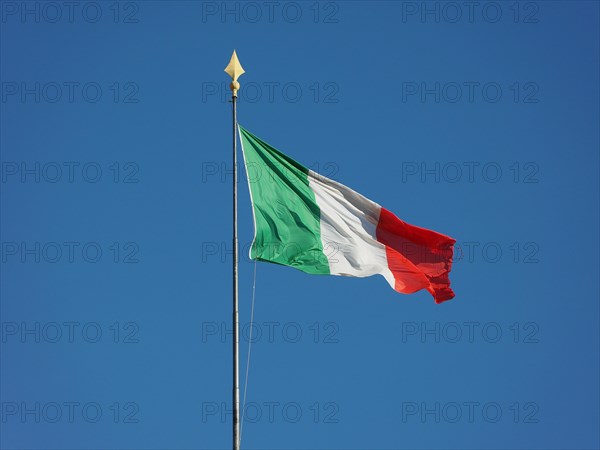 Italian Flag of Italy over blue sky