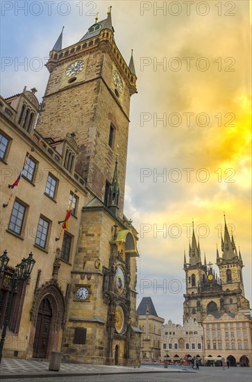 Beautiful Old Town Square with Church of our Lady Tyn and medieval astronomical clock on the Old Town Hall Tower, in Prague, Czech Republic, at sunrise, Europe
