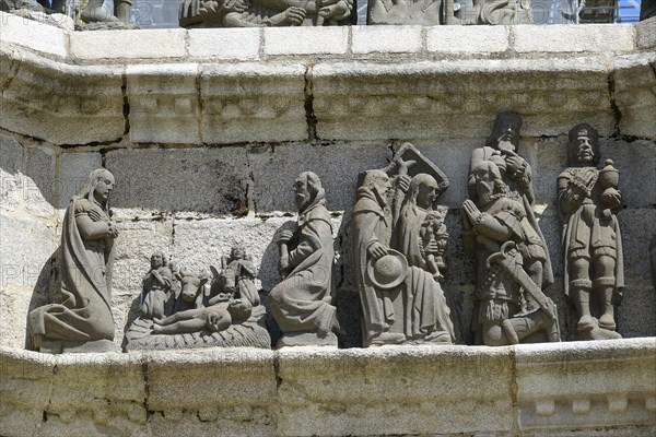 Stone reliefs Nativity, Adoration of the Magi, Calvary Calvaire, Enclos Paroissial de Pleyben enclosed parish from the 15th to 17th century, Finistere department, Brittany region, France, Europe