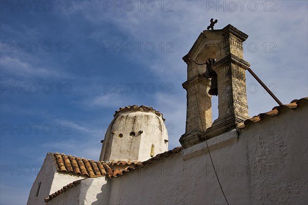 Church of St Michael the Archangel, Cross-domed church, The white bell tower of a church rises into the blue sky, Aradena Gorge, Aradena, Sfakia, Crete, Greece, Europe