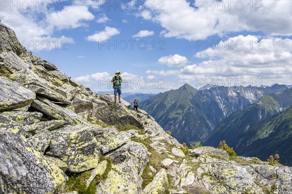 Two mountaineers on hiking trail, Berliner Hoehenweg, mountain panorama with summit Tristner, Zillertal Alps, Tyrol, Austria, Europe