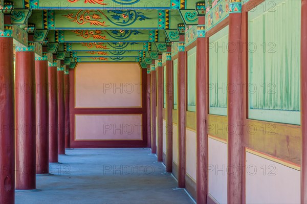 Buyeo, South Korea, July 7, 2018: Walkway under pavilion with details of colorful ceiling at Neungsa Baekje Temple, Asia