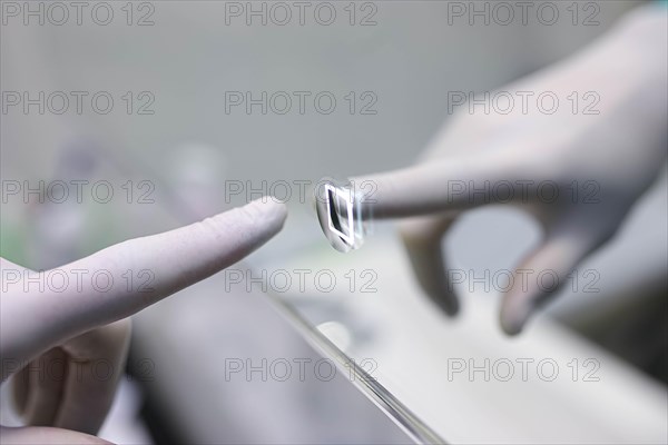 Finger touch glowing button on the mirror display. 3d technology in everyday life