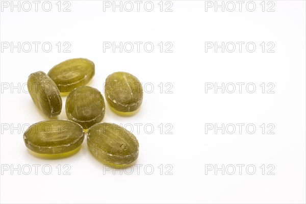 Hard candy sweets shot over white background