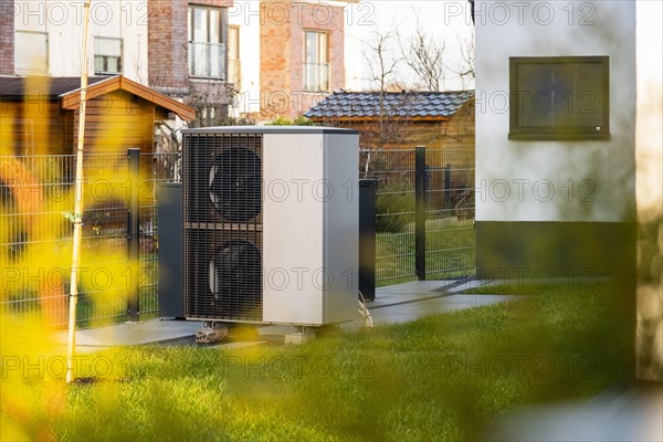 A heat pump in front of an apartment block in Duesseldorf, Germany, Europe