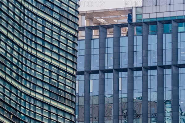 Tall highrise office building with glass exteriors in downtown Seoul, South Korea, Asia