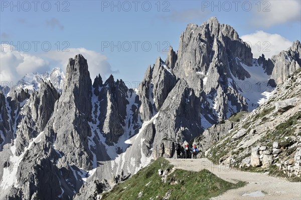 Hiker, mountain panorama facing south in Alta Pusteria, Sesto, Dolomites, South Tyrol, Italy, Europe