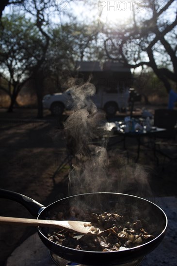 Camping with breakfast, morning, camping, roof tent, cooking, food, outdoor, safari, holiday, tourism, travel, travel style, adventure, Namibia, Africa