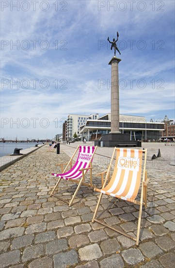 Deckchairs on the quay promenades, Helsingborg, Skane laen, Sweden, Europe