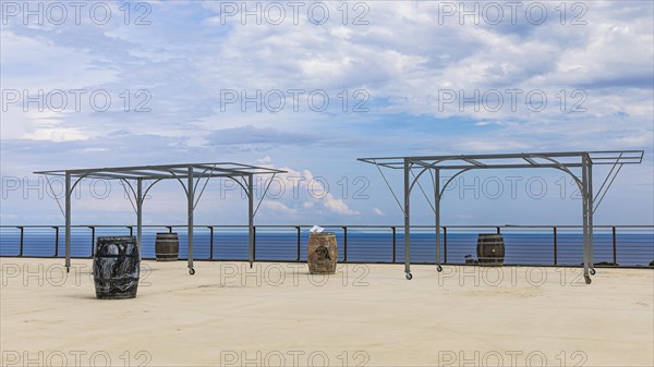 Wine barrels on the terrace of the Tenuta delle Ripalte winery, Elba, Tuscan Archipelago, Tuscany, Italy, Europe