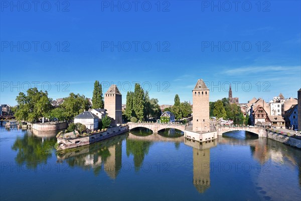 Strasbourg, France, September 2023: Historical tower of 'Ponts Couvert' bridge as part of defensive work erected in the 13th century on the River Ill in 'Petite France' quarter of Strasbourg city, Europe