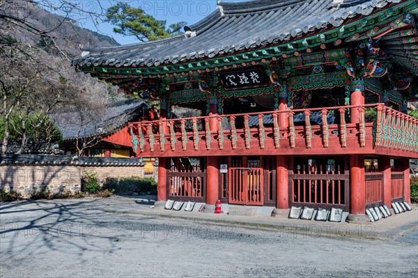 Bell and drum pavilion on sunny autumn day at Buddhist temple