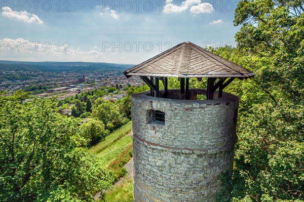 Stone observation tower surrounded by trees with a view of a landscape, Wartbergturm, Pforzheim, Germany, Europe