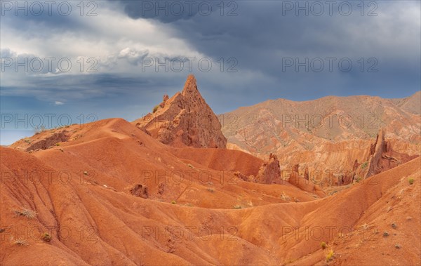 Eroded mountain landscape, sandstone cliffs, canyon with red and orange rock formations, Konorchek Canyon, Chuy, Kyrgyzstan, Asia