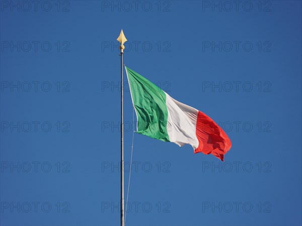 Italian Flag of Italy over blue sky