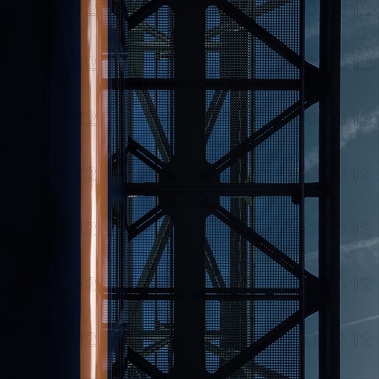 View of a dark, textured ceiling design with a mysterious orange light at the edge, suspension railway, Wuppertal, North Rhine-Westphalia, Germany, Europe