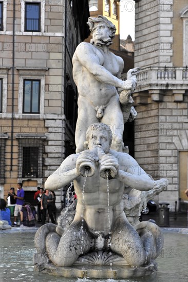 Fountain figure of a Triton, Moor Fountain or Fontana del Moro, Piazza Navona, Rome, Lazio, Italy, Europe