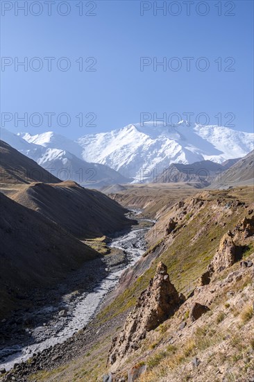 Valley with river Achik Tash between high mountains, mountain landscape with peak Pik Lenin, Osh province, Kyrgyzstan, Asia