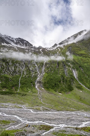 Mountain streams flow over steep mountain slopes into the Schlegeisgrund valley, cloudy rocky mountains, Furtschaglhaus, Berliner Hoehenweg, Zillertal, Tyrol, Austria, Europe