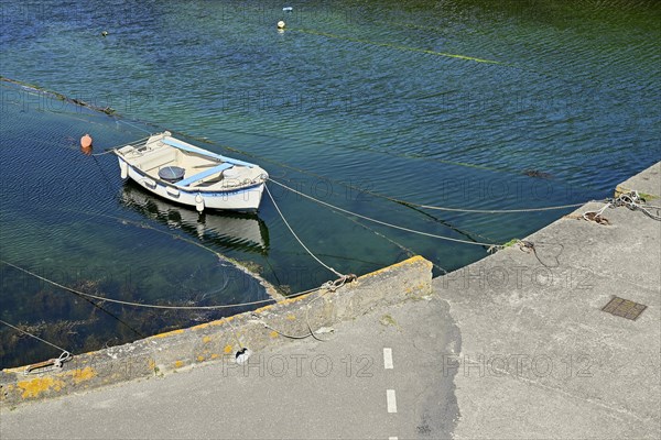 Boat in the small inland harbour of Lampaul, Ouessant Island, Finistere, Brittany, France, Europe