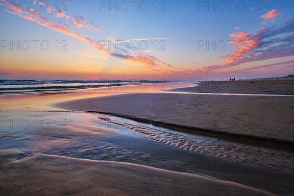 Atlantic ocean after sunset with surging waves at Fonte da Telha beach, Costa da Caparica, Portugal, Europe