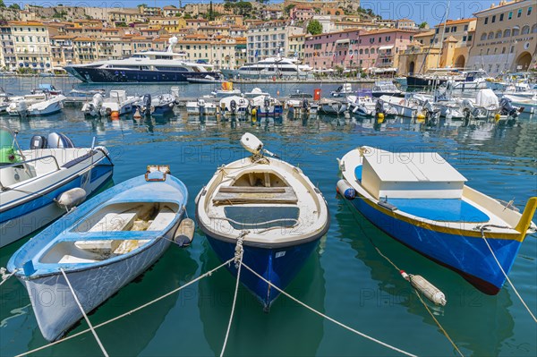 Fishing boats and luxury yachts in the harbour of Portoferraio, Elba, Tuscan Archipelago, Tuscany, Italy, Europe