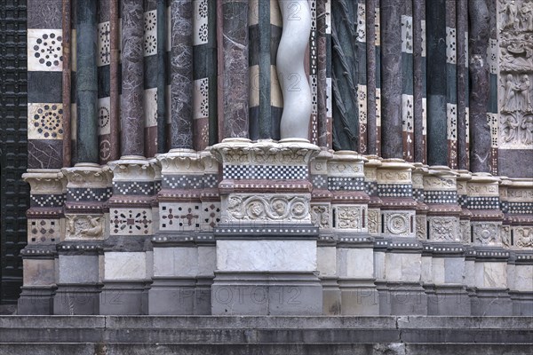 Decorative bases of the columns on the entrance facade of San Lorenzo Cathedral, opened in 1098, Piazza S. Lorenzo, Genoa, Italy, Europe