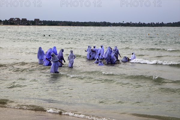 Muslim girls bathing in their clothes, Pasikudah Bay, Eastern Province, Sri Lanka, Asia