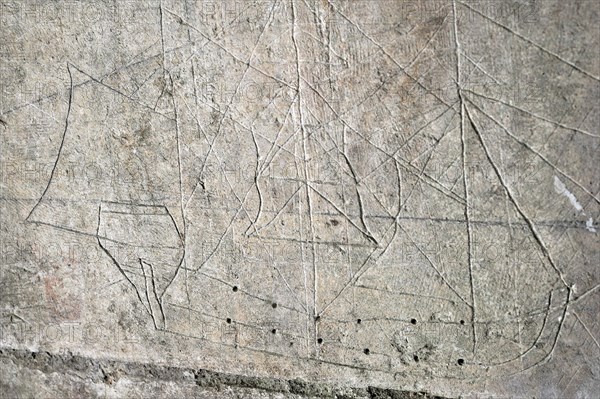 Old graffiti of galleon sailing ship carved on rampart wall of the citadel at Brouage, Hiers-Brouage, Charente-Maritime, France, Europe