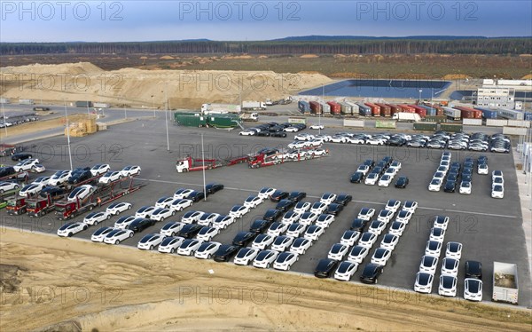 Tesla Y models produced in the Tesla Giga Factory are loaded onto car transporters, Gruenheide, 12 November 2022