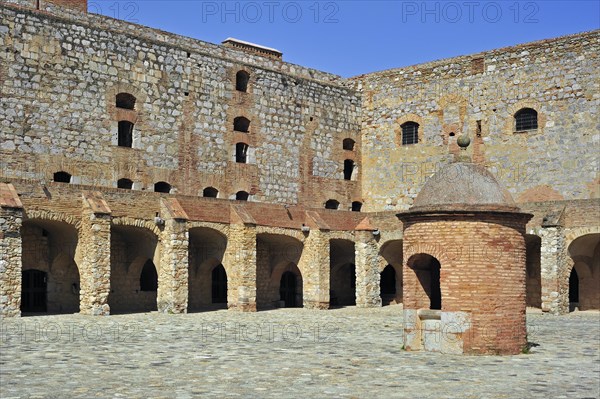 Inner court and well of the Catalan fortress Fort de Salses at Salses-le-Chateau, Pyrenees, France, Europe