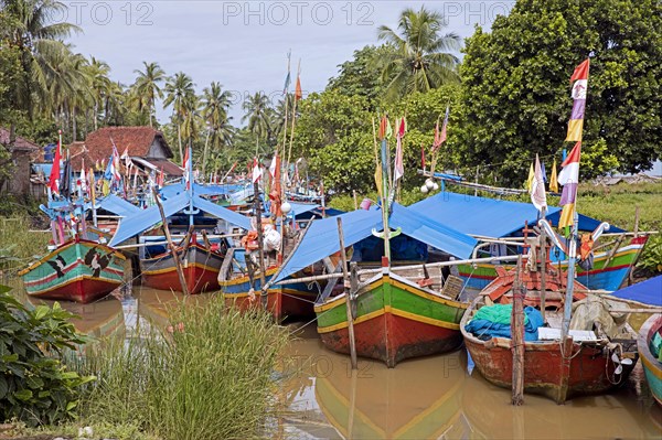 Traditional wooden fishing boats in the coastal town Carita, Pandeglang Regency, Banten Province, West Java, Indonesia, Asia