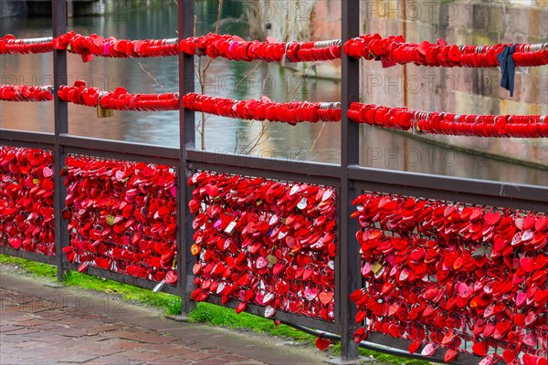 Countless red love locks on railings, Little Venice, Petite Venise, Der Fischerstaden, Colmar, Alsace, France, Europe