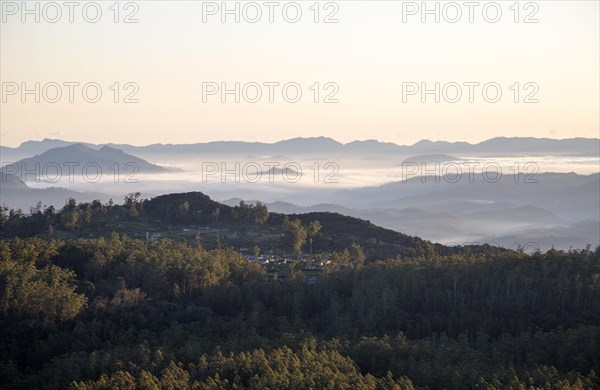 Early morning clouds near Nuwara Eliya viewed from Horton Plains national park, Sri Lanka, Asia