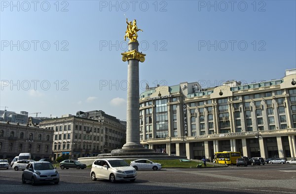 Column with the statue of St George as a dragon fighter on Freedom Square, Tavisuplebis Moedani, Tbilisi, Georgia, Asia