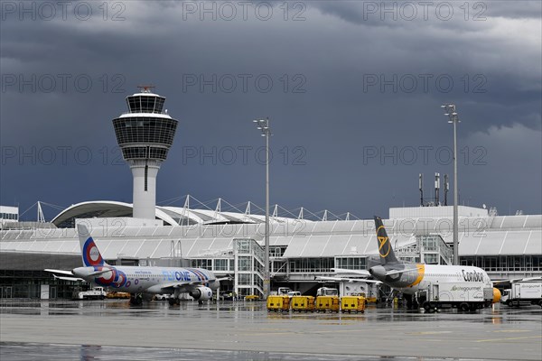 Condor and FLYONE at check-in position at Terminal 1 with storm and rain cloud, Munich Airport, Upper Bavaria, Bavaria, Germany, Europe