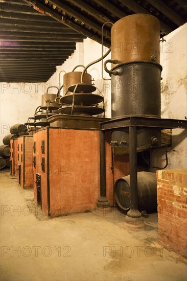 Old distilling equipment for brandy cognac production in Gonzalez Byass bodega, Jerez de la Frontera, Cadiz province, Spain, Europe