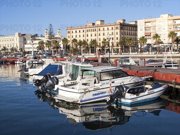 Boats in harbour and town centre buildings, Melilla. Spanish territory in north Africa, Spain, Europe