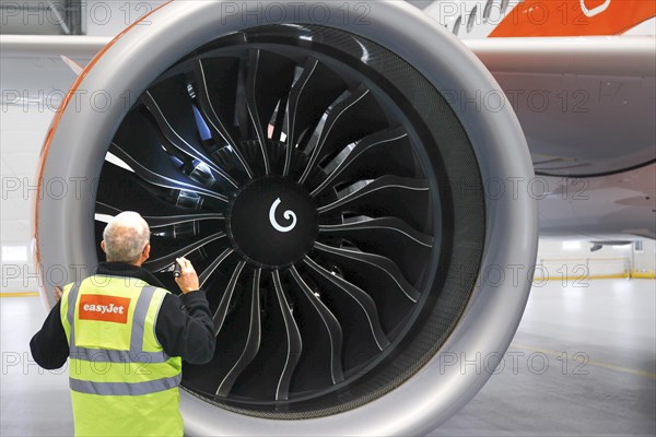 Olaf Gross, Licence Engineer at easyJet, checks the engine of an Airbus A320 Neo in front of the opening of the new easyJet maintenance hangar at Berlin Brandenburg Airport, BER. The entire European easyJet fleet is maintained at the Schoenefeld site