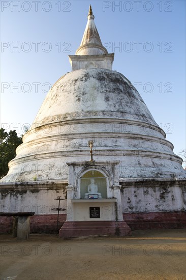 White stupa dome of Buddhist temple at Mirissa, Sri Lanka, Asia