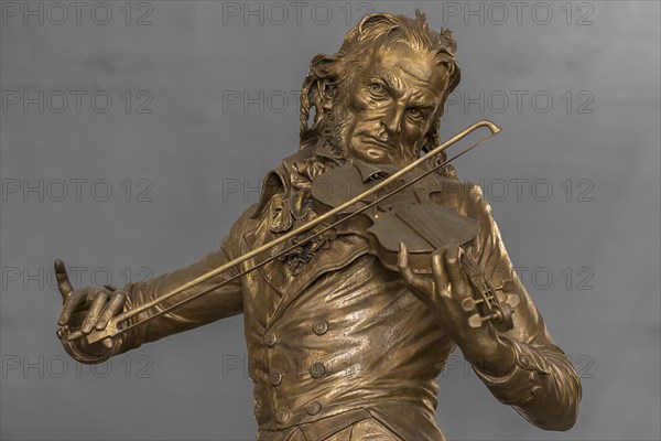Detailed view of the bronze statue of the violinist Niccolo Paganini by the artist Niccolo Tommaseo, entrance hall of the Teatro Carlo Felice, Passo Eugenio Montale, 4, Genoa, Italy, Europe