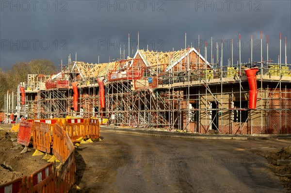 Building site construction new homes, Persimmon housing estate, Honours Meadow, Rendlesham, Suffolk, England, UK