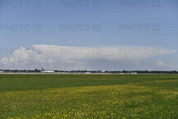Overview airport with thundercloud in storm front in the background, Munich Airport, Upper Bavaria, Bavaria, Germany, Europe