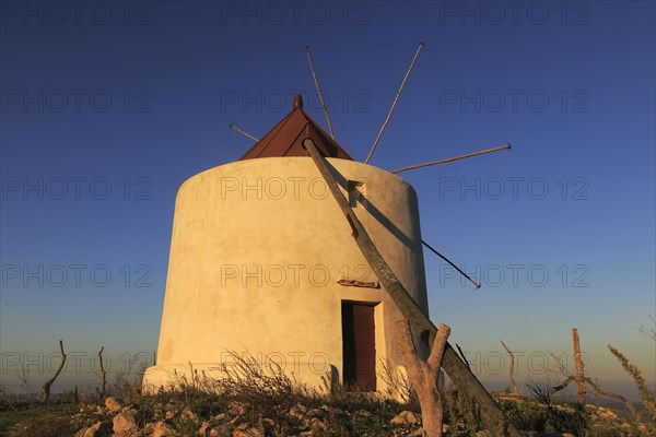 Traditional windmill at dusk, Vejer de la Frontera, Cadiz Province, Spain, Europe
